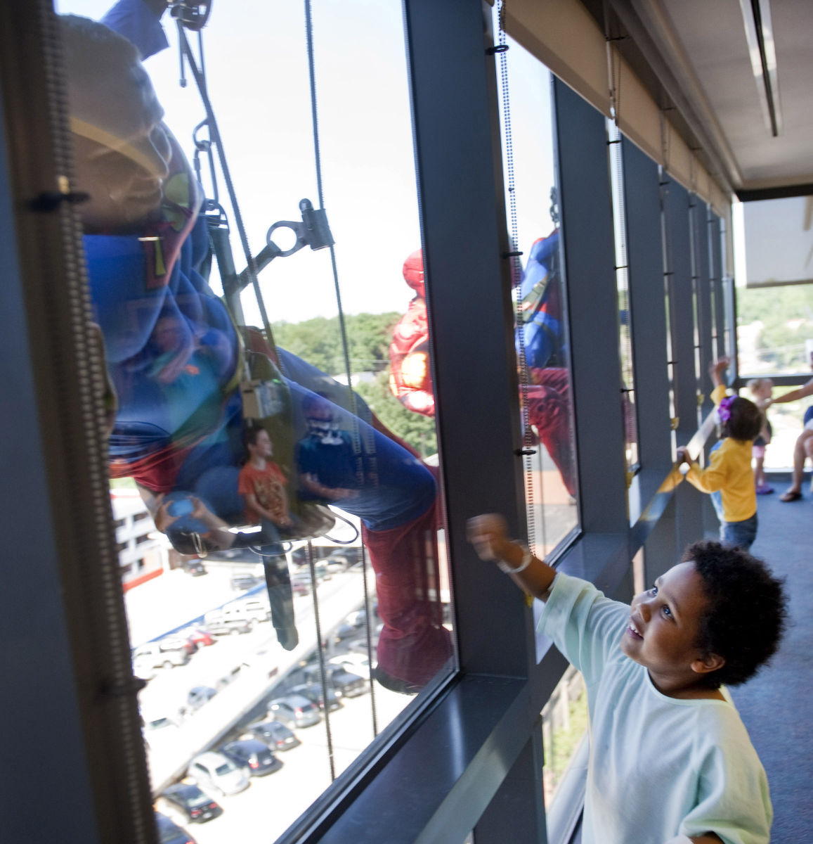 'Superheroes' Scale Brenner Children's Hospital To Delight Of Patients ...