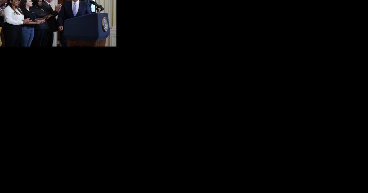 Biden marks 1year anniversary of major climate health and tax law Were leaving nobody behind