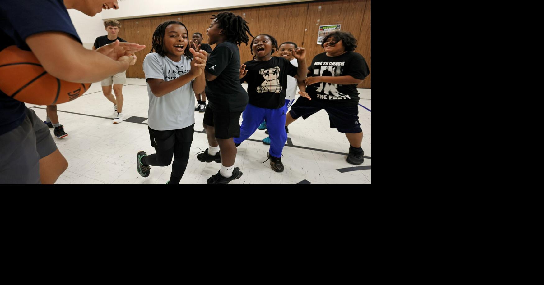 Bishop McGuinness players hold basketball clinic with Griffith students, see the photos