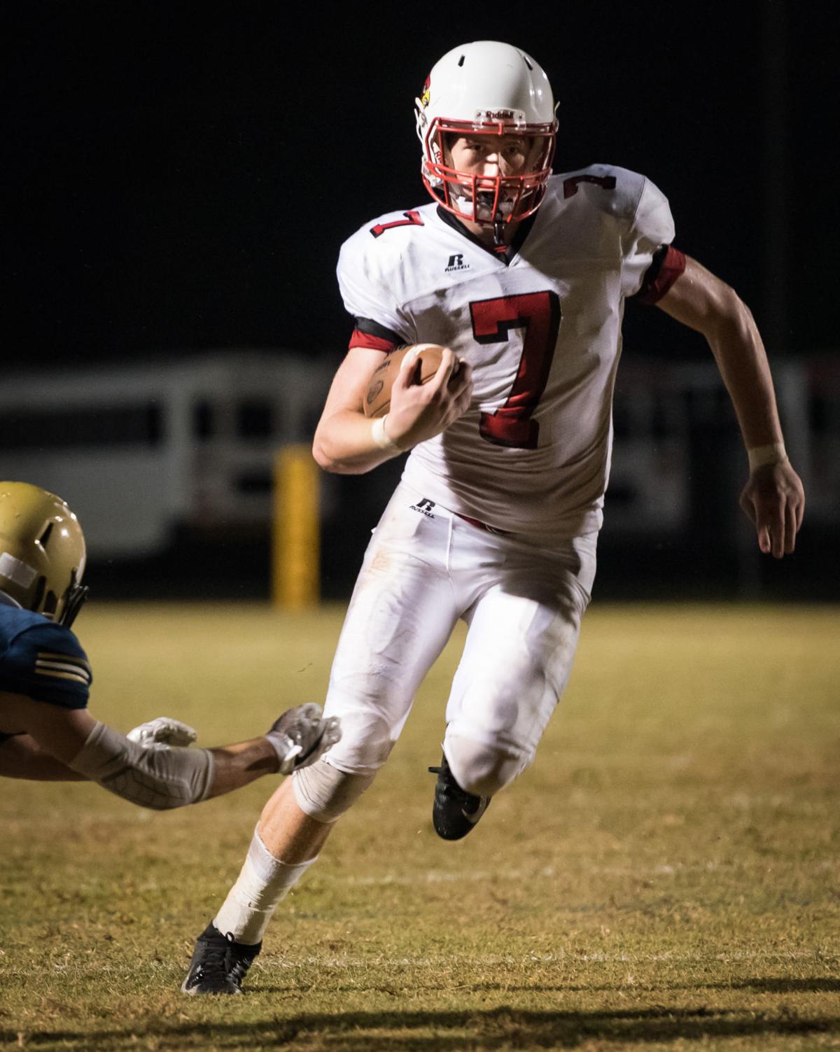 East Surry football's Jefferson Boaz grew up a Carolina fan. He East Surry football's Jefferson Boaz grew up a Carolina fan. He