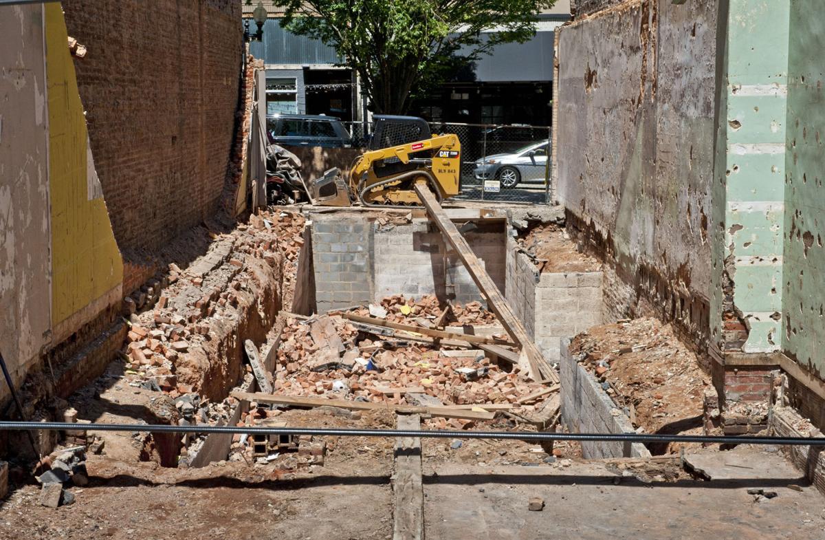 Worker pinned by collapsed brick wall expected to recover; site under