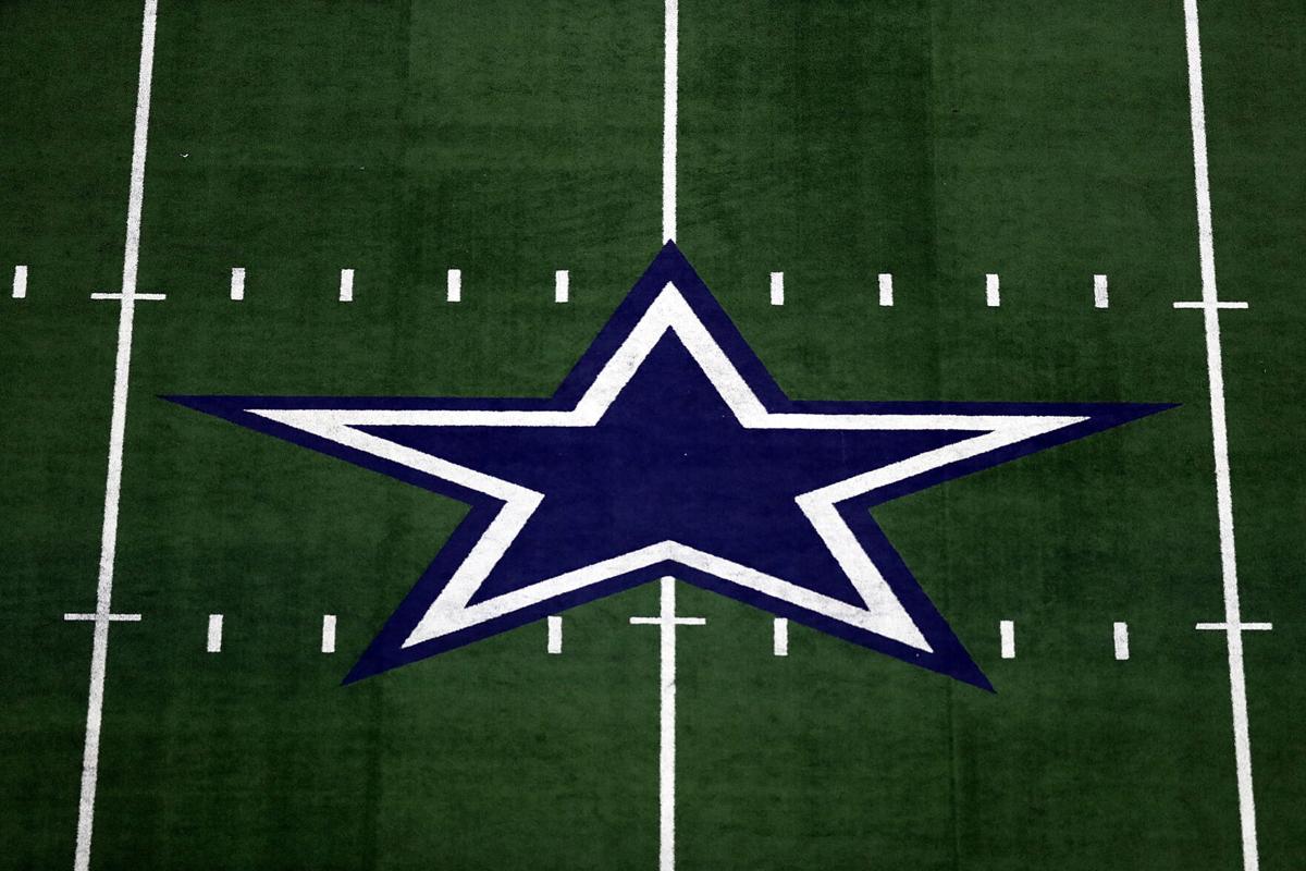 The Dallas Cowboys logo at AT&T Stadium on Sept. 30, 2018 in Arlington, Texas.