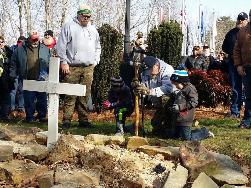 Community members gather for peaceful protest at King Veteran's