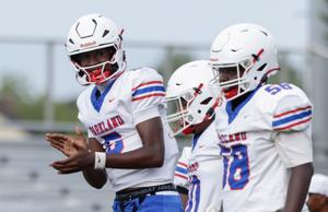 Parkland and Reagan Quarterbacks Honor Late Parents During Football Season