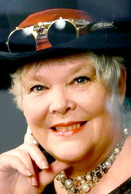 Komara, Linda Stoltz