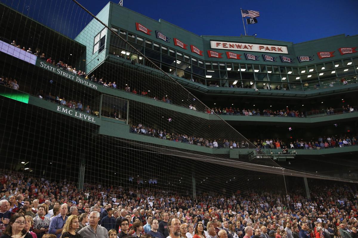 Red Sox fan vomits on to fans sitting in tier below him during game at  Fenway Park