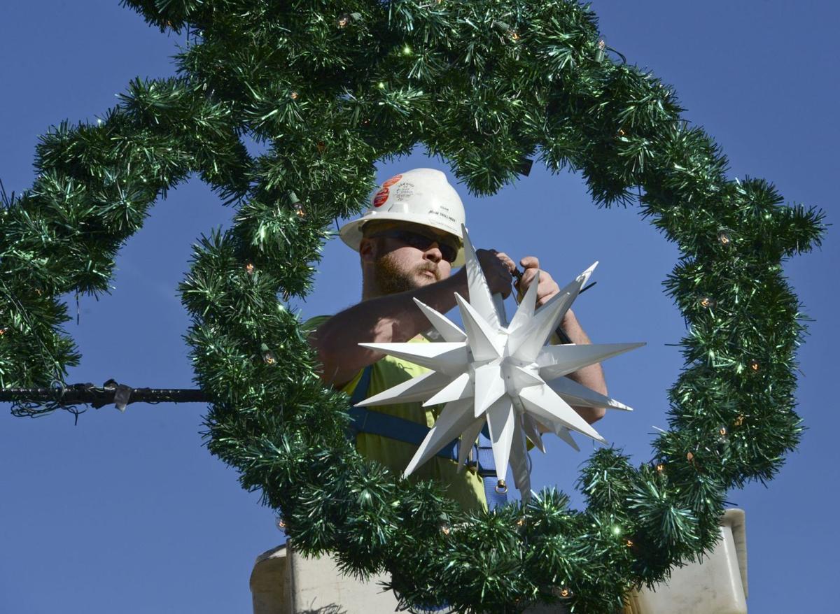 Decorations Go Up In Downtown Winston Salem In Advance Of Holiday