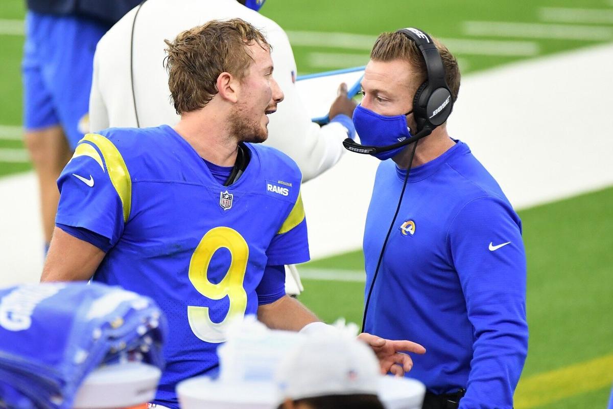 Los Angeles Rams quarterback John Wolford talks with head coach Sean McVay on the sideline at SoFi Stadium in Inglewood, Calif., on Jan. 3, 2021..