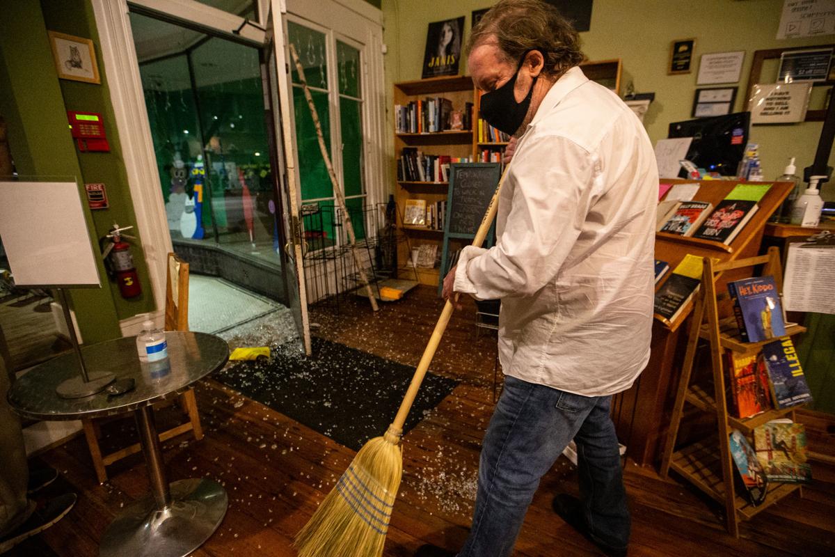 Watch Now Surveillance Video Of Sunday Night Looting Greensboro Businesses Clean Up Again After Sunday S Unrest Local News Journalnow Com