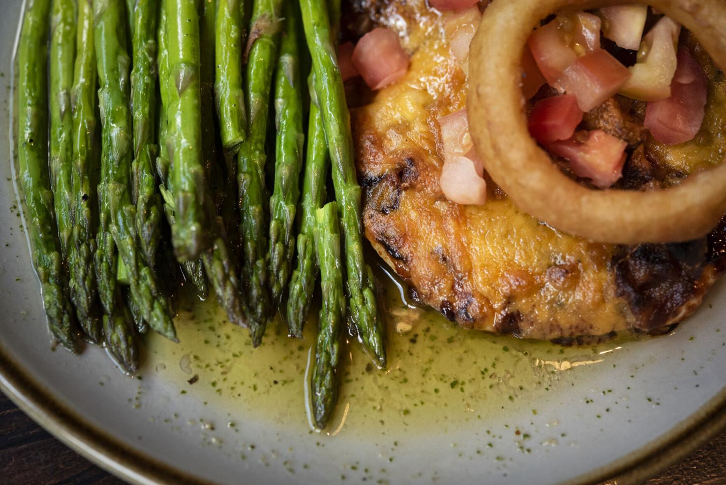 Spotted Cow steakhouse opens on Trade