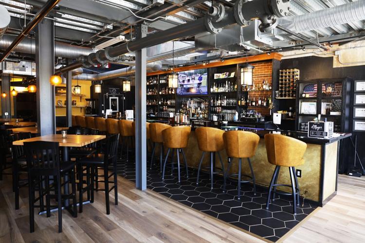 Couple opens Grapes and Grain bar in Revolution Mill