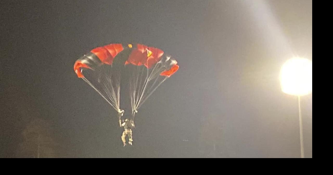 Fans were treated to parachute jumps during a break in Modified race