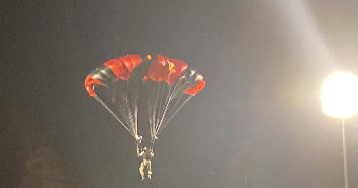 Fans were treated to parachute jumps during a break in Modified race
