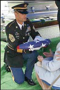 military honor guard funeral flag presentation