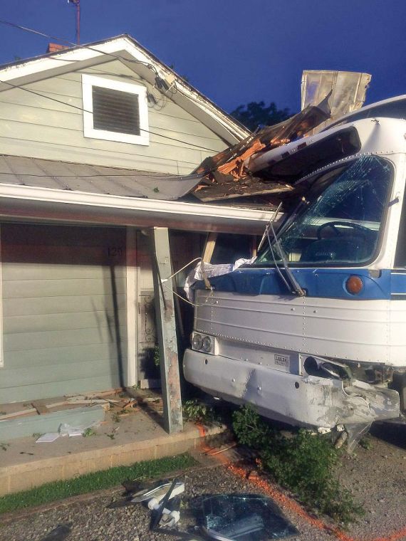 Bus hits two houses after colliding with car Friday News
