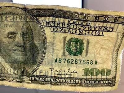100 dollars in one dollar bills