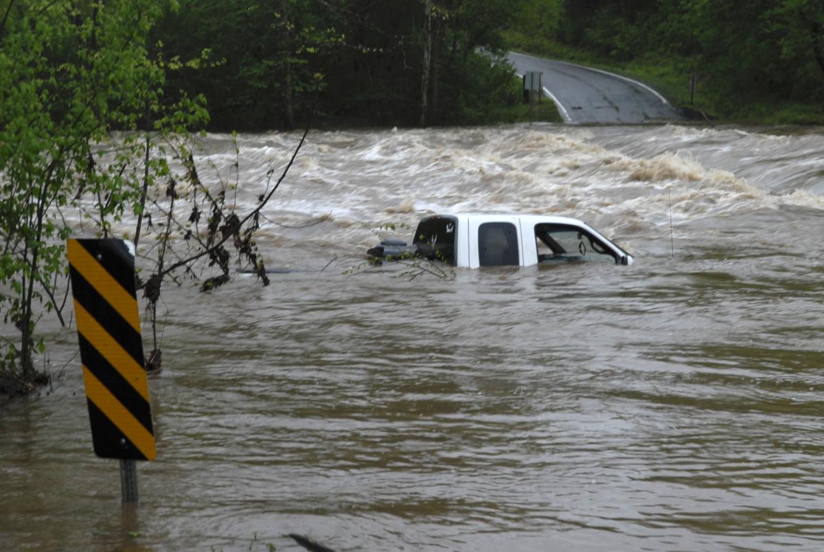 Flooding reported; man rescued from atop pickup in Roaring River News