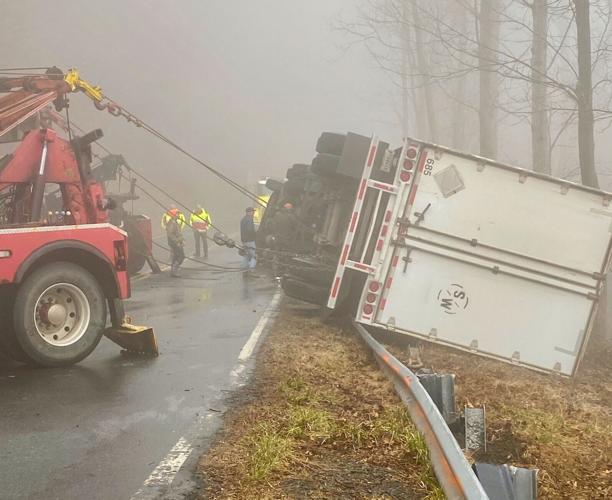 Tractor-trailer overturns on U.S. 21