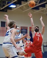 East boys dispatch North in finale, 61-53