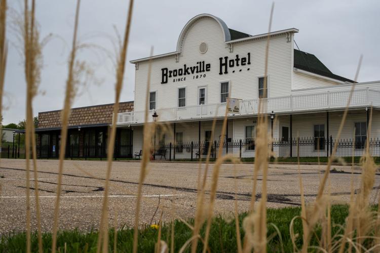 Brookville Hotel behind grass