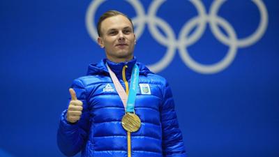 PYEONGCHANG-GUN, SOUTH KOREA - FEBRUARY 19:  Gold medalist Oleksandr Abramenko of Ukraine celebrates during the medal ceremony for the Freestyle Skiing - Men's Aerials on day 10 of the PyeongChang 2018 Winter Olympic Games at Medal Plaza on February 19,...