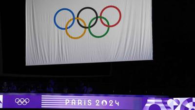 An Olympic ring flag during the Paris 2024 Olympic Summer Games at the Porte de La Chapelle Arena.