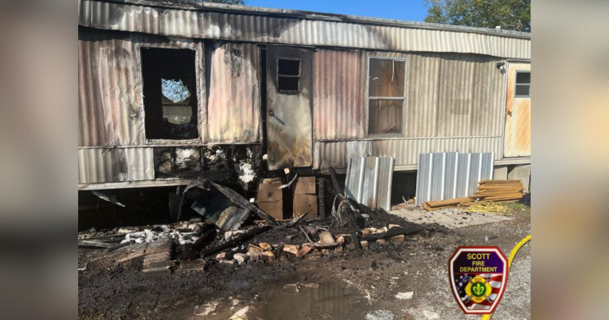 Lafayette Parish firefighters rescue man from burning mobile home, another person injured; dog died
