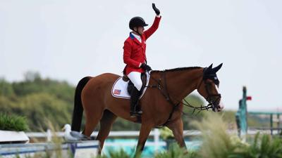 McLain Ward and horse Ilex of Team United States celebrate after their round in the Jumping Team Final on day seven of the Olympic Games Paris 2024 at Chateau de Versailles on August 02, 2024 in Versailles, France.