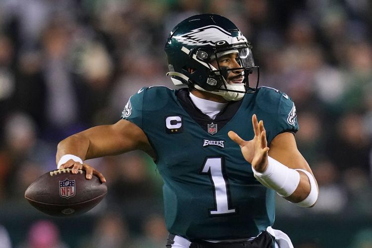 Download Jalen Hurts leading the Philadelphia Eagles to victory! Wallpaper