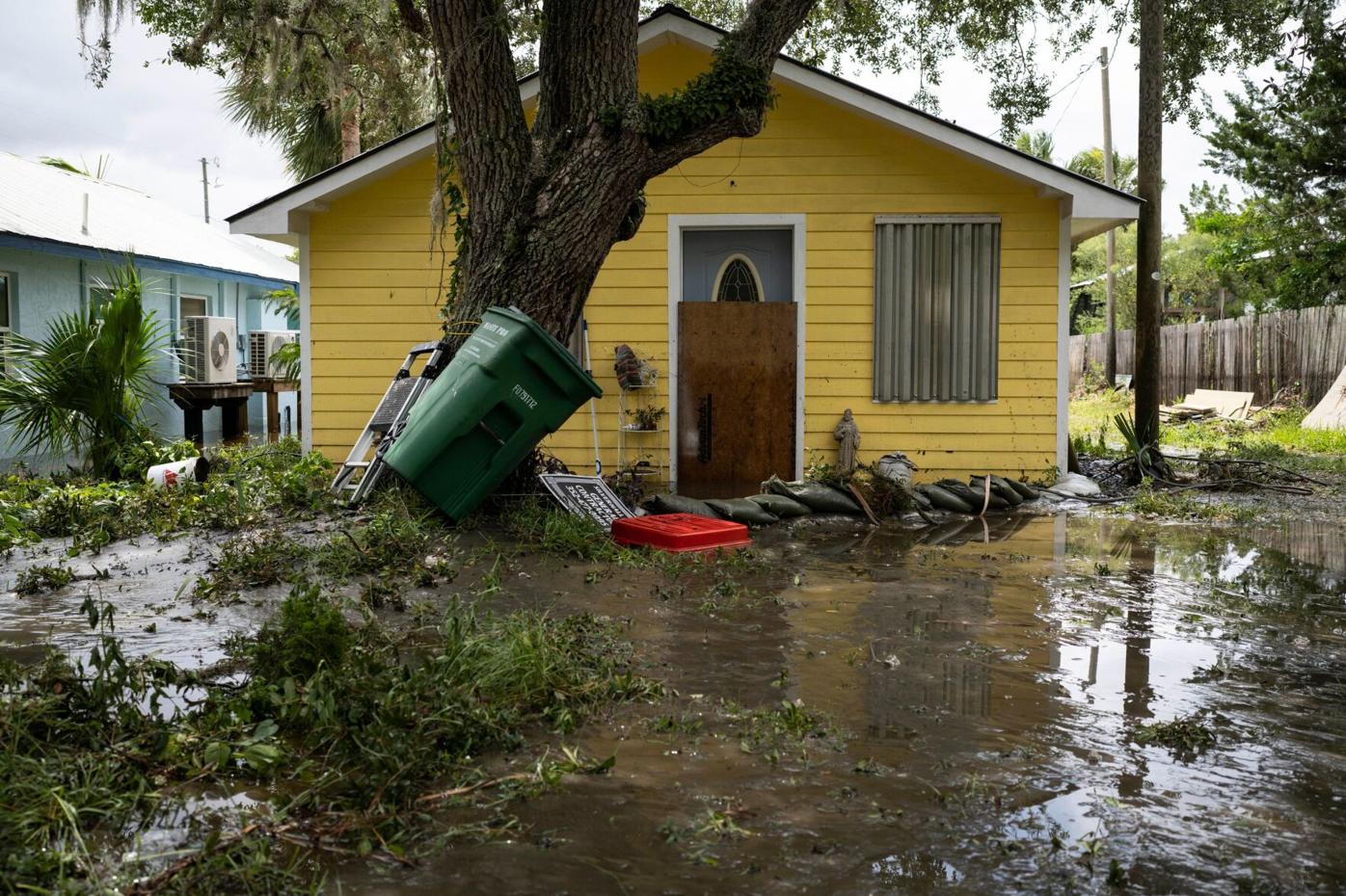 Residents pick through rubble, navigate clogged roads after Idalia