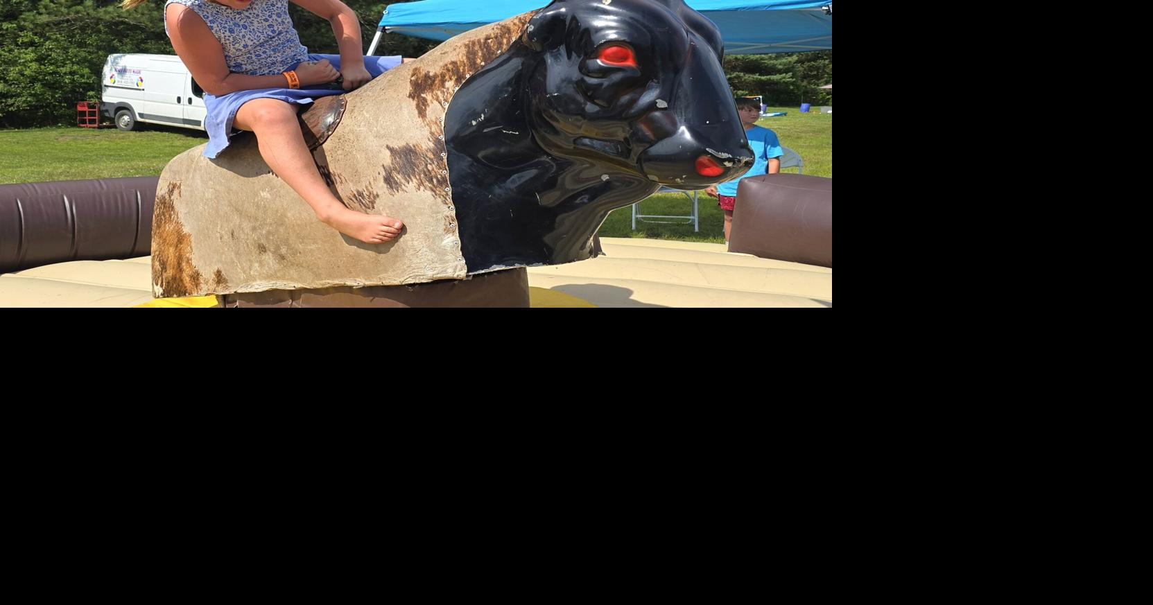 Mechanical bull riding brings extra thrills to Squatchfest