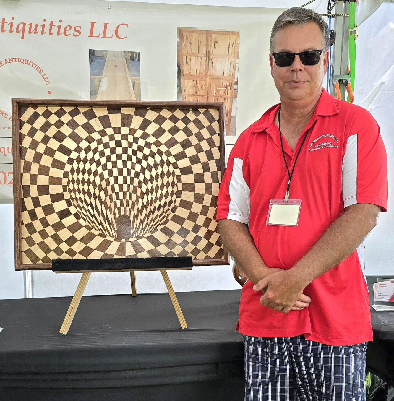 Illusionary artistry in woodwork at Art in the Wilds