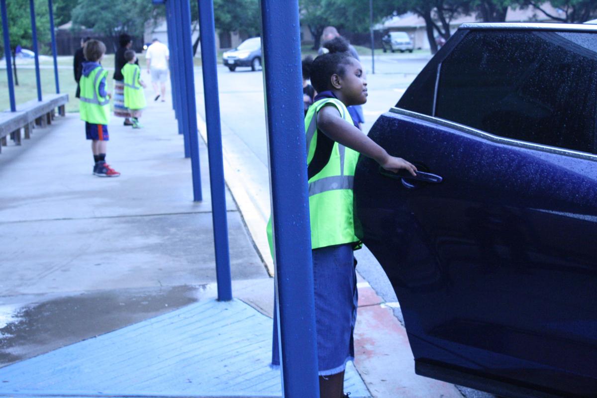 Students learn life skills as Greeter Leaders at Martin Walker