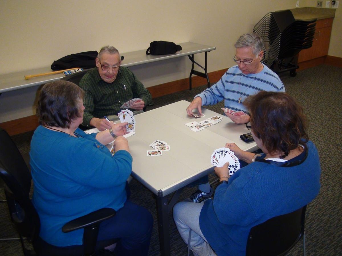 Players gather for challenging games of pinochle at Heights ...