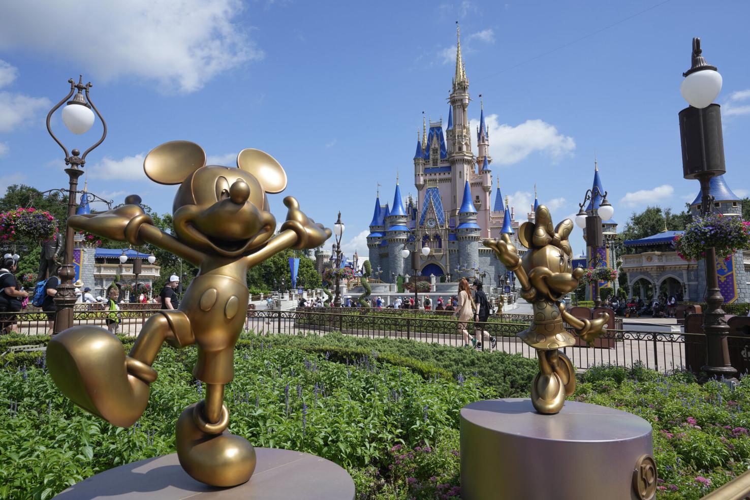 With deal done, Disney withdraws lawsuit, ending last conflict with ...