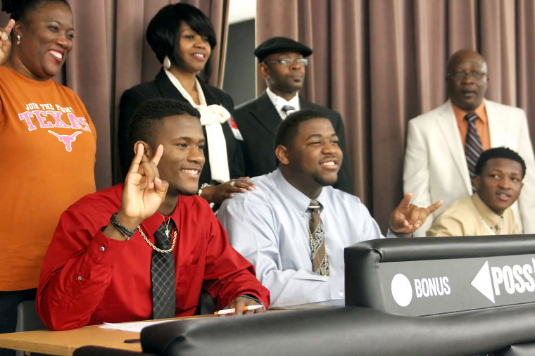 Heights trio sign with DI schools