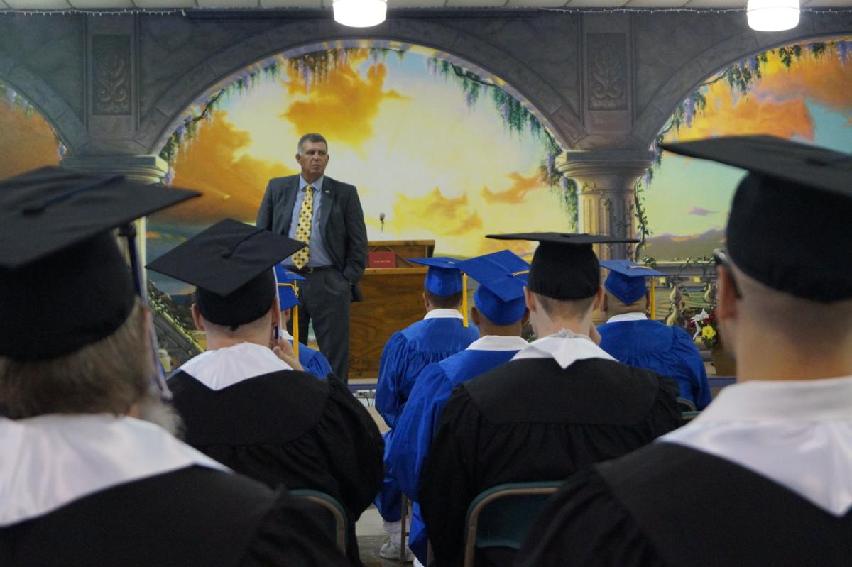 At a prison in Gatesville, inmates walk across the stage Education