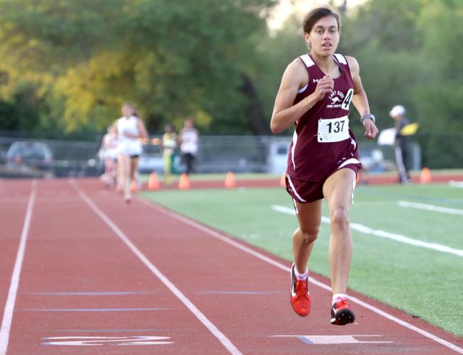 75A/85A AREA TRACK NOTEBOOK 85A champ Heights girls finish third