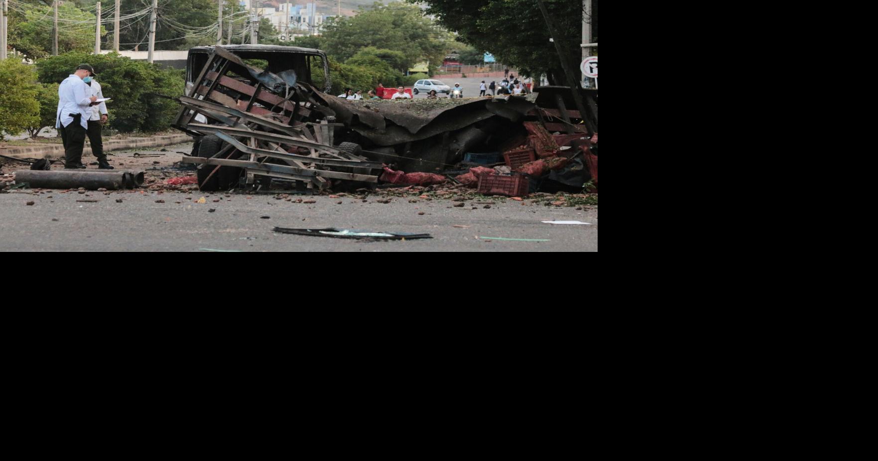 Truck explodes outside Colombia police base, injuring 11 officers and killing a dog | News