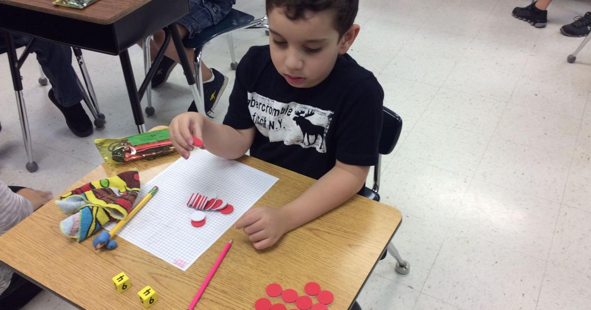 Students multiply learning by building arrays of colored counters ...