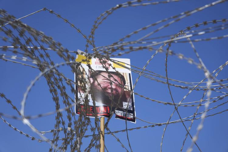 Demonstrators seeking release of Gaza hostages march in London as Middle East tensions grip UK