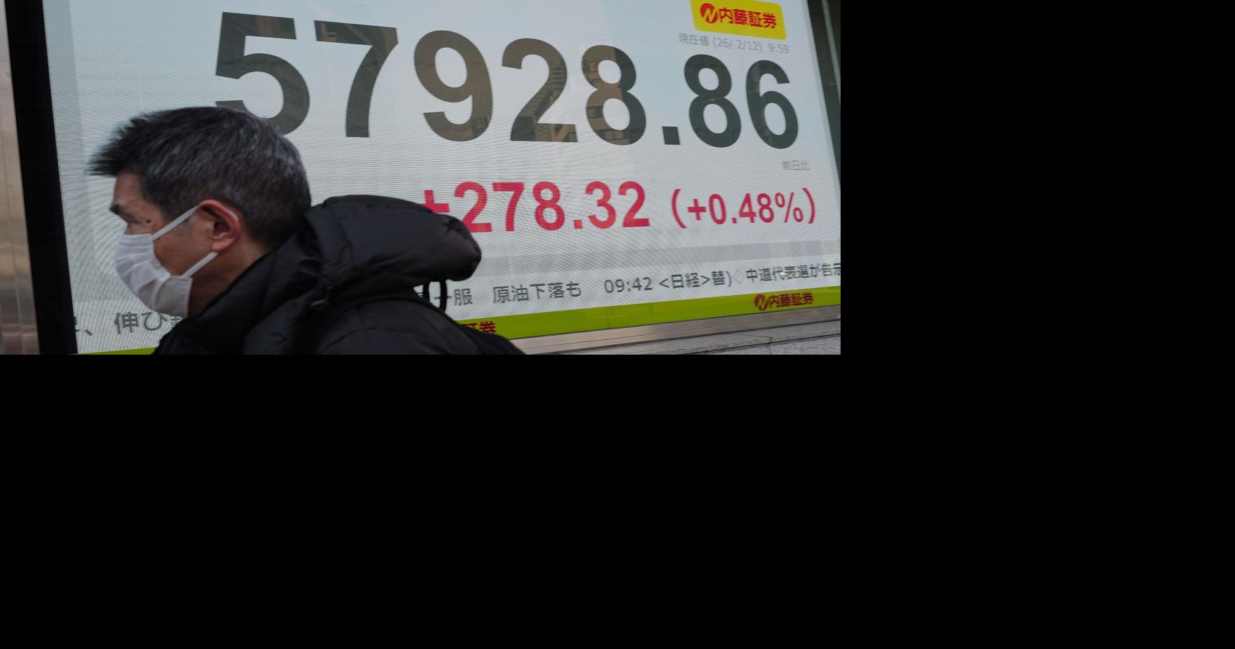 World shares mostly gain after Wall Street wobbled over strong jobs report