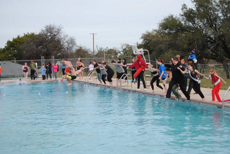 Cove residents gather to plunge in the city pool, Local News