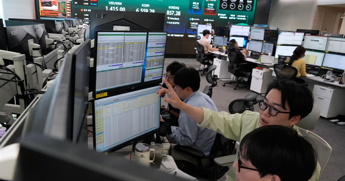 Wall Street rises near a record as AI stocks climb and worries about inflation ease a bit