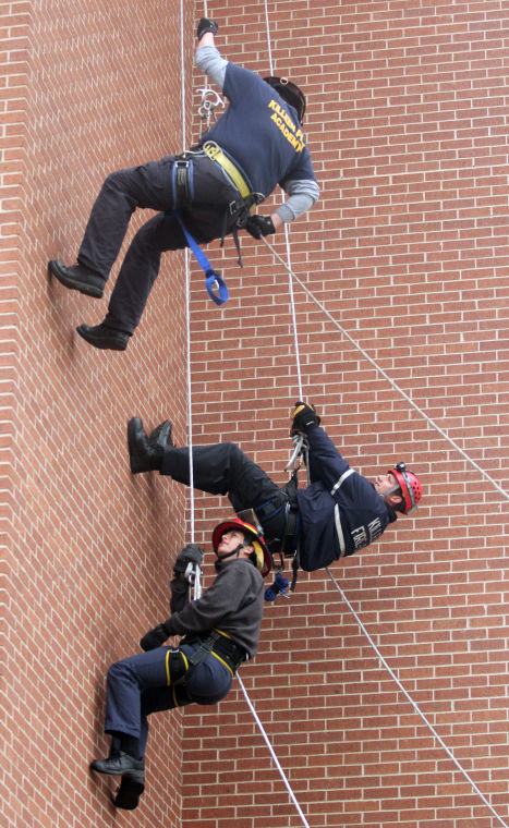 Firefighters Rappelling
