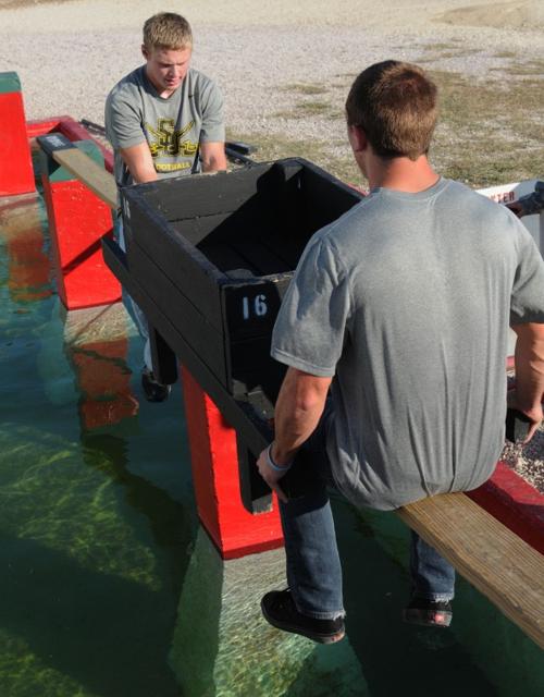 Taking a box across an obstacle