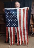 Killeen veteran finds tattered US flags in dumpsters on Fort Hood