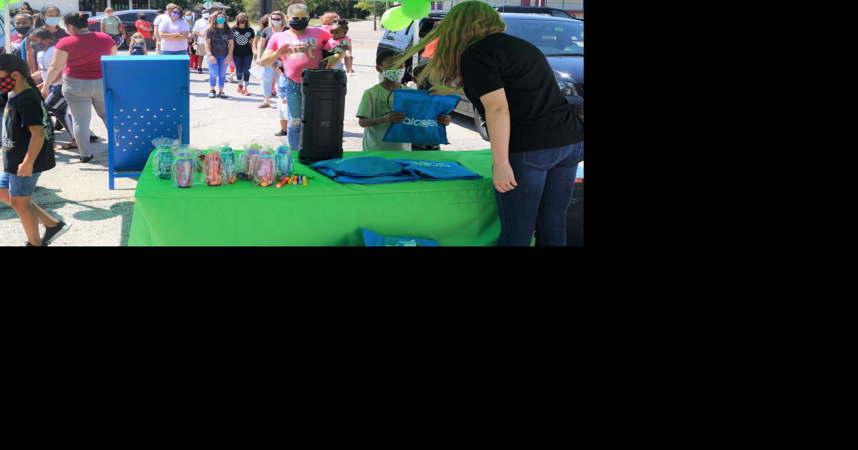 Cricket Wireless employees in Cove team up to provide free backpacks