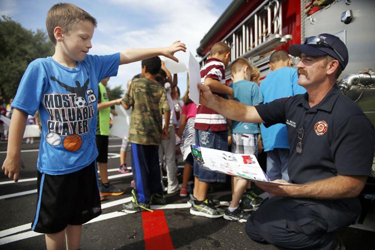 Elementary school students honor first responders on 14th anniversary