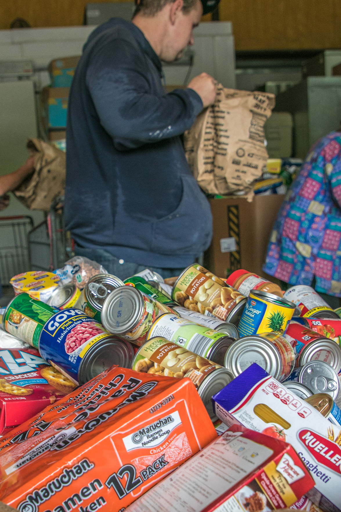 Food Care Center Processes Stamp Out Hunger Donations